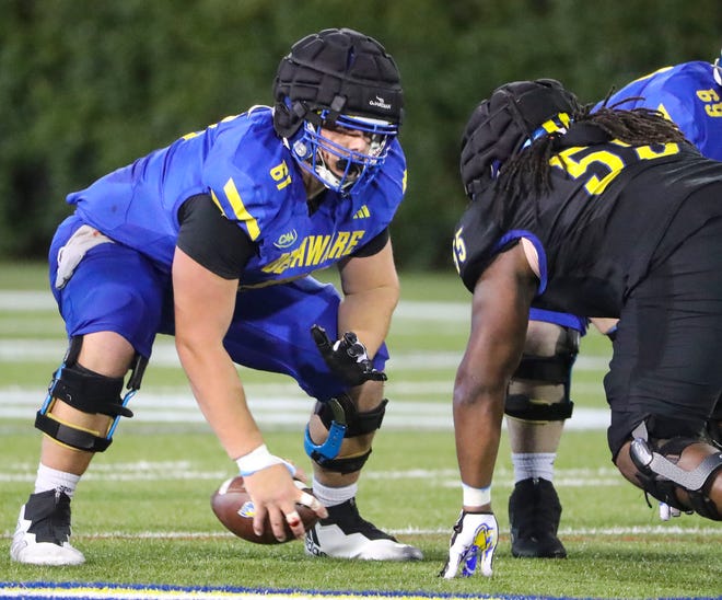 Delaware offensive lineman Steven Demboski handles the center duties during the Blue and White Spring Game at Delaware Stadium, Friday, April 19, 2024.