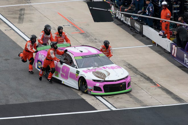 Chase Elliott's team pushes his car down pit road due to engine trouble at the Drydene 400 - Monster Energy NASCAR Cup Series playoff auto race, Sunday, Oct. 6, 2019, at Dover International Speedway in Dover.