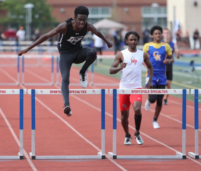 Sussex Tech's Yougendy Mauricette clears the final jump to win the Division I 300 meter hurdles on the second and final day of the DIAA state high school track and field championships Saturday, May 22, 2021 at Dover High School.