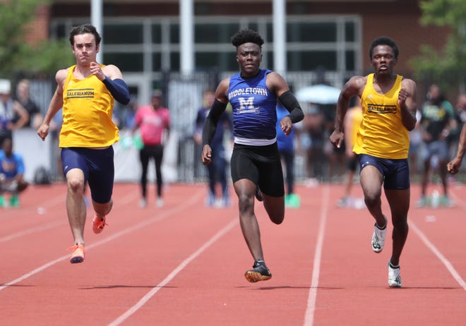 Salesianum's Michael Portale (left) edges Middletown's Tysean Baronette in the Division I 100 meter dash on the second and final day of the DIAA state high school track and field championships Saturday, May 22, 2021 at Dover High School. Salesianum's Amari Mathis runs at right.