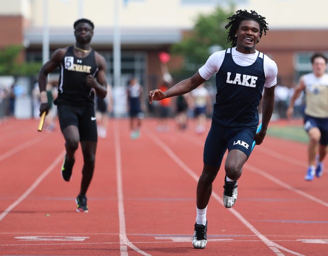 Lake Forest's Kendal Smith finishes in first place as his team grabs the Division II 4x100 meter relay title on the second and final day of the DIAA state high school track and field championships Saturday, May 22, 2021 at Dover High School.