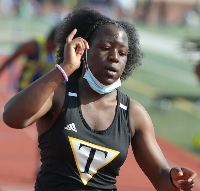 Tatnall's Alexis Tarlue reacts after winning the Division II 100 meter hurdles on the second and final day of the DIAA state high school track and field championships Saturday, May 22, 2021 at Dover High School.