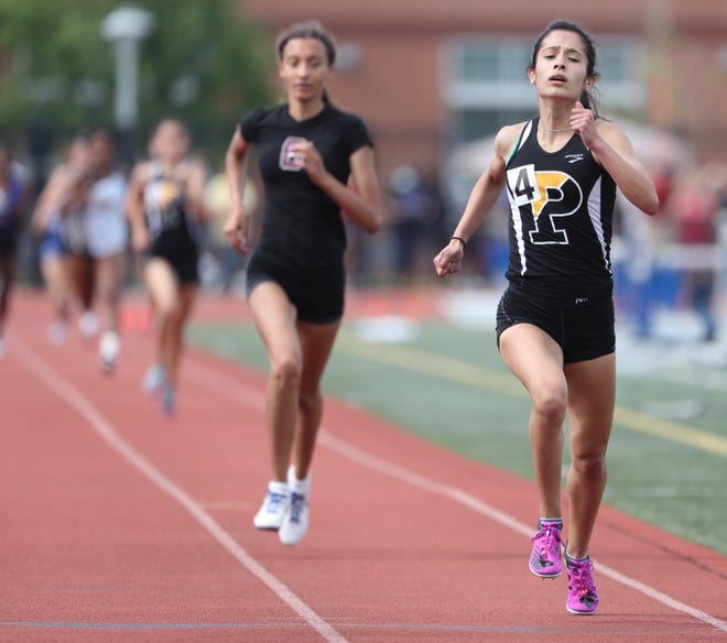 Padua's Judy McLaughlin pushes the final few meters to hold off Concord's Jessica Lamborn to win the Division I 800 meter race on the second and final day of the DIAA state high school track and field championships Saturday, May 22, 2021 at Dover High School.