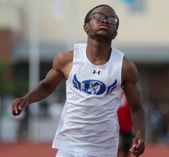 Dover's Tyjhir Joyner earns first place in the Division I 200 meter dash on the second and final day of the DIAA state high school track and field championships Saturday, May 22, 2021 at Dover High School.