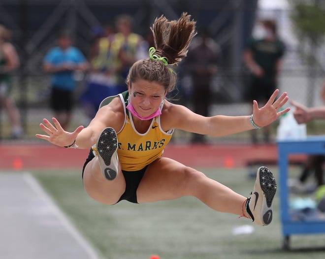 St. Mark's triple jumper Danni McGonigle leaps toward her title win in the Division II event on the second and final day of the DIAA state high school track and field championships Saturday, May 22, 2021 at Dover High School.