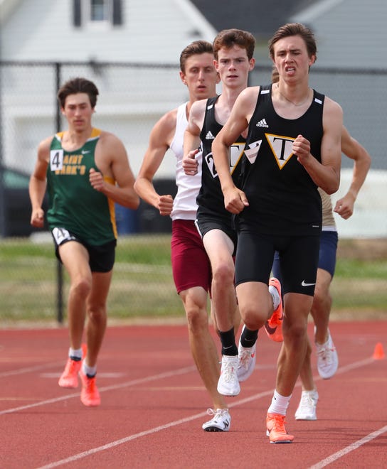 Tatnall's Declan McDonnell leads the Division II 1600 meter race early before winning the race on the second and final day of the DIAA state high school track and field championships Saturday, May 22, 2021 at Dover High School.