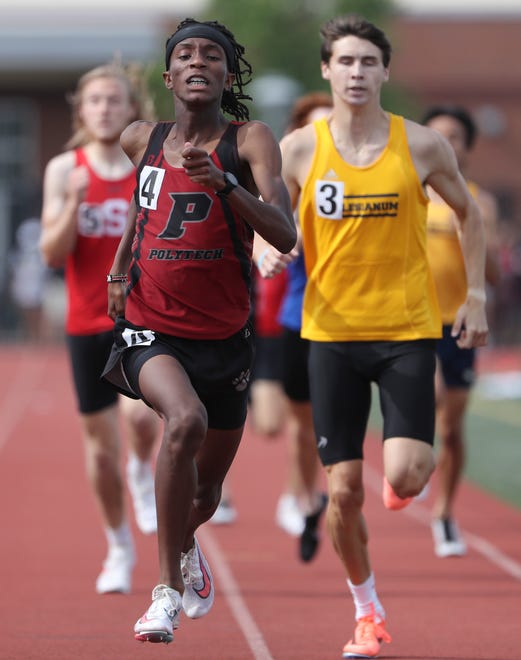 Polytech's Matt Gatune wins the Division I 800 meter race on the second and final day of the DIAA state high school track and field championships Saturday, May 22, 2021 at Dover High School.