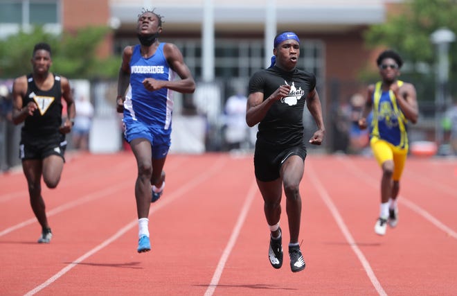 Howard's Zyaire Nuriddin (third from left) wins the Division II 200 meter dash ahead of second place finisher Deronn Kane of Woodbridge on the second and final day of the DIAA state high school track and field championships Saturday, May 22, 2021 at Dover High School.