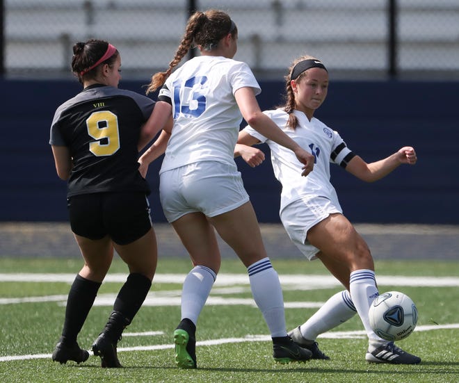 Charter School of Wilmington's Mae Plum plays the ball in front of teammate Julia Koval (13) and Padua's Anna Poehlmann in the first half of the Pandas' 4-0 DIAA DIv. I state tournament semifinal win at Abessinio Stadium Tuesday, May 25, 2021.