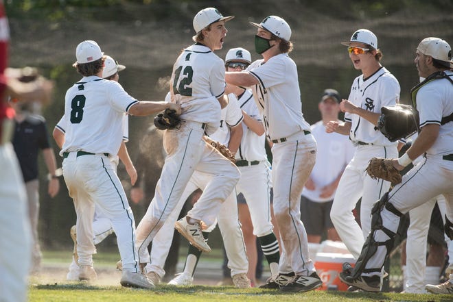 St. Mark's players celebrate a crucial out at home plate late in their DIAA quarterfinal game against Smyrna Tuesday, May 24, 2021. St. Mark's defeated Smyrna 7-0 to advance to the DIAA semifinals.