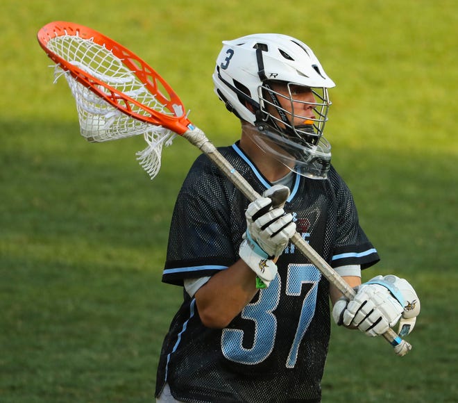 Cape Henlopen goalie Carson Kammerer looks to unload the ball in the second half of the Vikings' 16-15 win at Sanford School in a semifinal of the DIAA state tournament Tuesday, May 25, 2021.