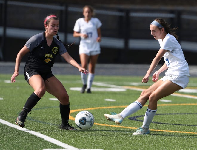 Padua's Anna Poehlmann (left) and Charter School of Wilmington's Jane DeVoll converge on the ball in the first half of the Pandas' 4-0 DIAA DIv. I state tournament semifinal win at Abessinio Stadium Tuesday, May 25, 2021.