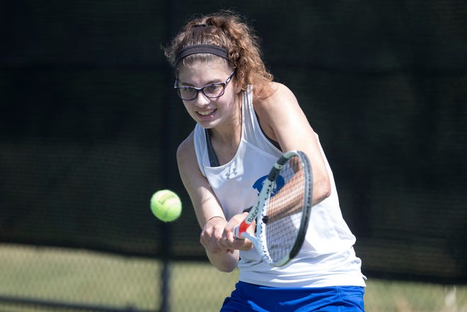 Dover's Erika Synoksi connects with the ball during her DIAA girl's first singles state championship match Thursday, May 27, 2021.