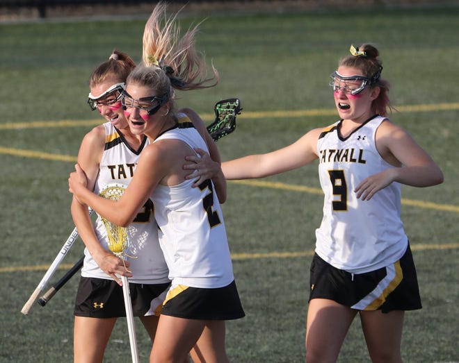 Tatnall's Kali Clayton, Avery Blumfield and Charlotte Wilkinson celebrate a goal in the second half the Vikings' 17-10 win in the  DIAA state tournament championship game Thursday, May 27, 2021 at Dover High School.