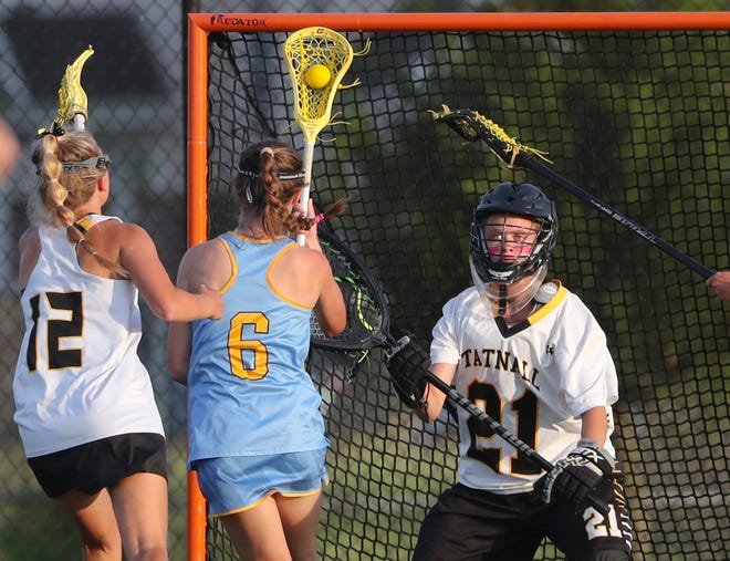Cape Henlopen's Louise Rishko moves in and scores on Tatnall goalie Carlie McKenry in the second half the Vikings' 17-10 win in the  DIAA state tournament championship game Thursday, May 27, 2021 at Dover High School.