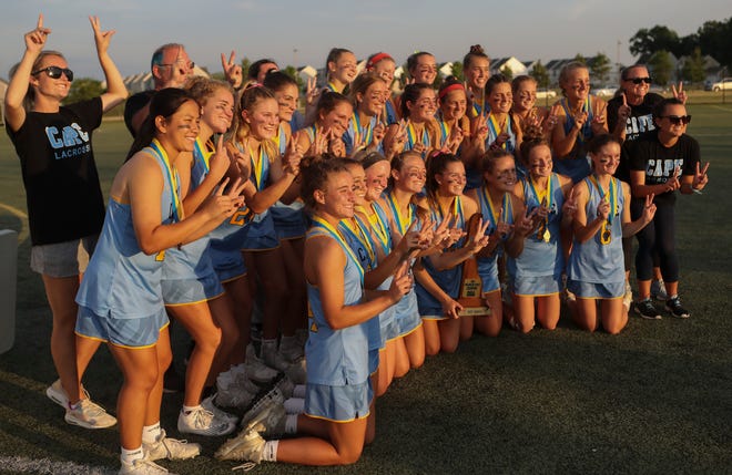Cape Henlopen flashes "12" for each of its consecutive titles after winning the DIAA state tournament championship game Thursday, May 27, 2021 at Dover High School.