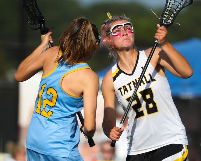 Cape Henlopen's Lindsay Rambo (left) faces off against Tatnall's Teryn Singer in the first half of the DIAA state tournament title game Thursday, May 27, 2021 at Dover High School.