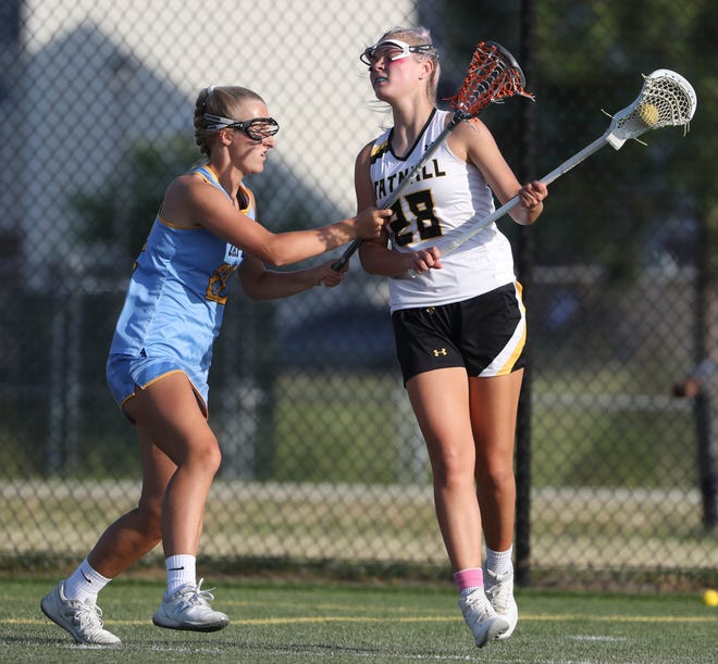 Cape Henlopen's Megan Smith (left) defends against Tatnall's Teryn Singer in the first half of the DIAA state tournament title game Thursday, May 27, 2021 at Dover High School.