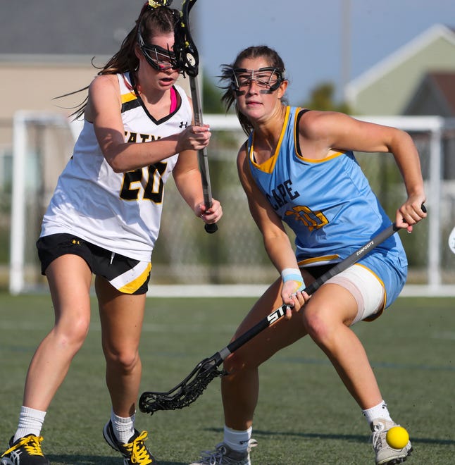 Tatnall's Ashley Marvel (left) and Cape Henlopen's Emily Monigle move for the ball in the first half of the DIAA state tournament Thursday, May 27, 2021 at Dover High School.