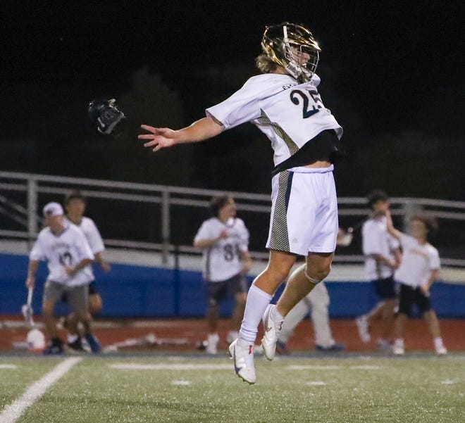 Salesianum's Dominic Rottura begins the celebration after the final seconds ticked off the clock in the second half of Salesianum's 12-10 win in the DIAA state tournament championship game Thursday, May 27, 2021 at Dover High School.