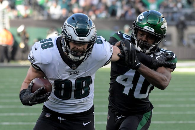 Philadelphia Eagles tight end Dallas Goedert (88) runs in a touchdown against New York Jets cornerback Javelin Guidry (40) during the first half of an NFL football game, Sunday, Dec. 5, 2021, in East Rutherford, N.J. (AP Photo/Bill Kostroun)